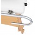 Massage table pad holder